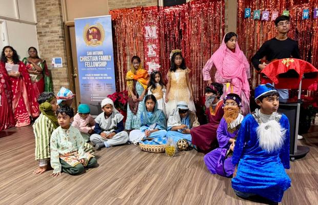 Children in nativity costumes presenting the Christmas story