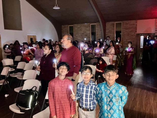 Boys of the fellowship in festive dress at an evening event