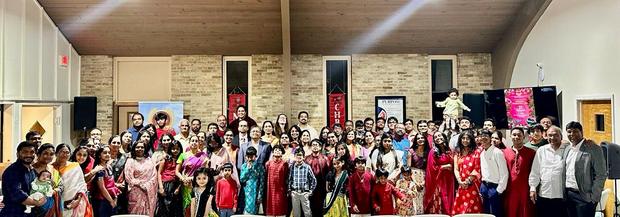 The congregation filling the hall